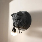 Dark gray decorbites bulldog resin wall lamp with three exposed bulbs hanging from mouth for living room decor