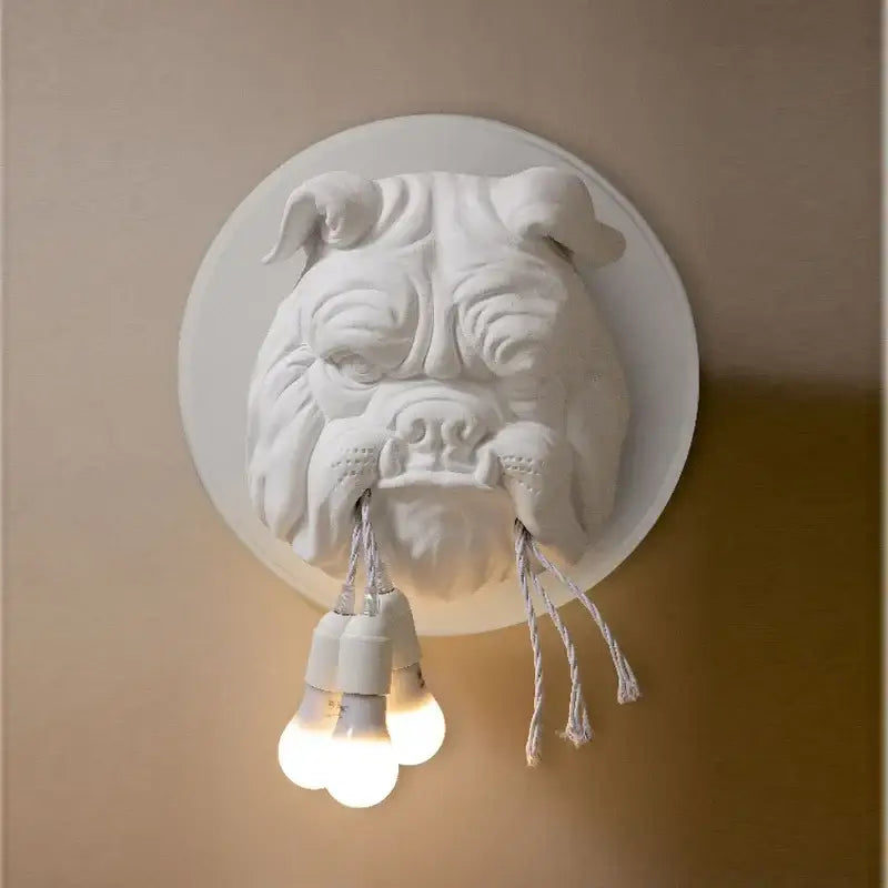 White ceramic decorbites bulldog resin wall lamp with three exposed bulbs hanging from the mouth for living room decor