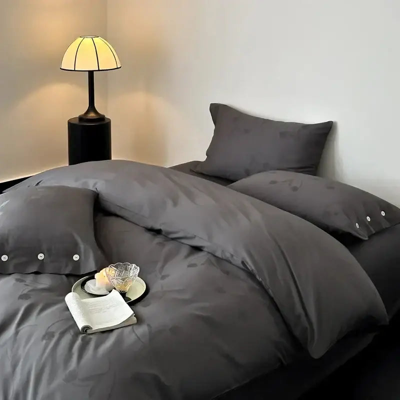 Dark gray egyptian cotton bedding set with subtle pattern and button detailing on pillowcases cotton bedding set