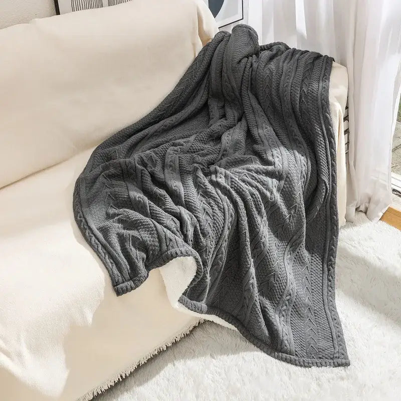Dark gray decorbites cozy double layer fishbone knit blanket with white fleece lining and fringed edges for living room decor