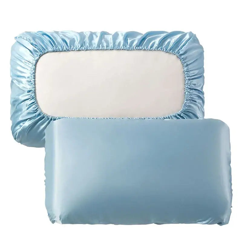 Light blue satin pillowcase with ruffled edges and matching pillow featuring decorbites imitation silk elastic band design