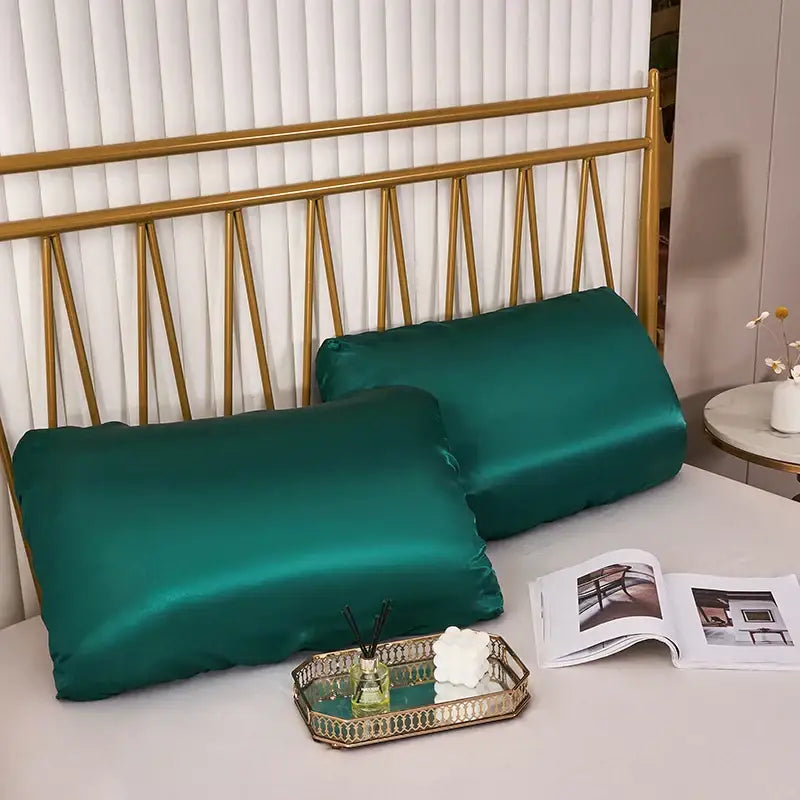 Emerald green satin pillowcases with a smooth glossy finish featuring decorbites imitation silk elastic band for bedding