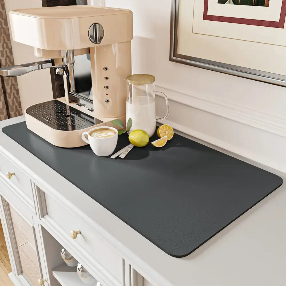 Dark gray silicone decorbites coffee mat with a smooth non-slip surface for absorbent kitchen drying use
