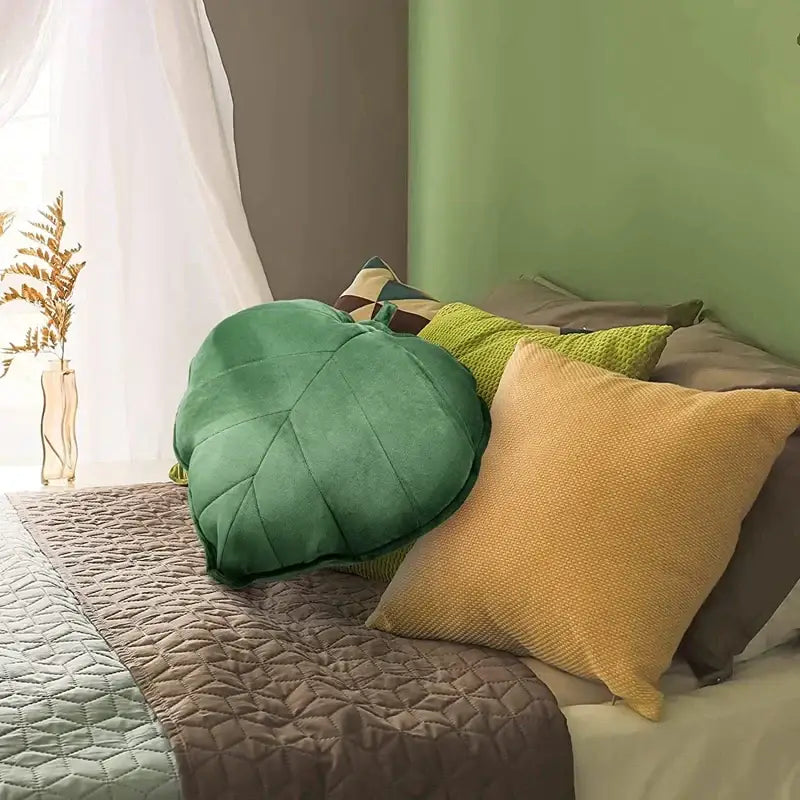 Dark green 3d leaf throw pillow with plush textured fabric and stitched veins for decorbites leaf throw decor