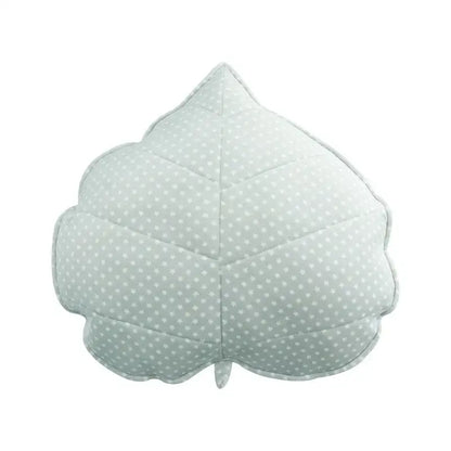 A soft plush light green leaf throw pillow with stitched edges and subtle white polka dots for bedroom decorbites 3d leaf