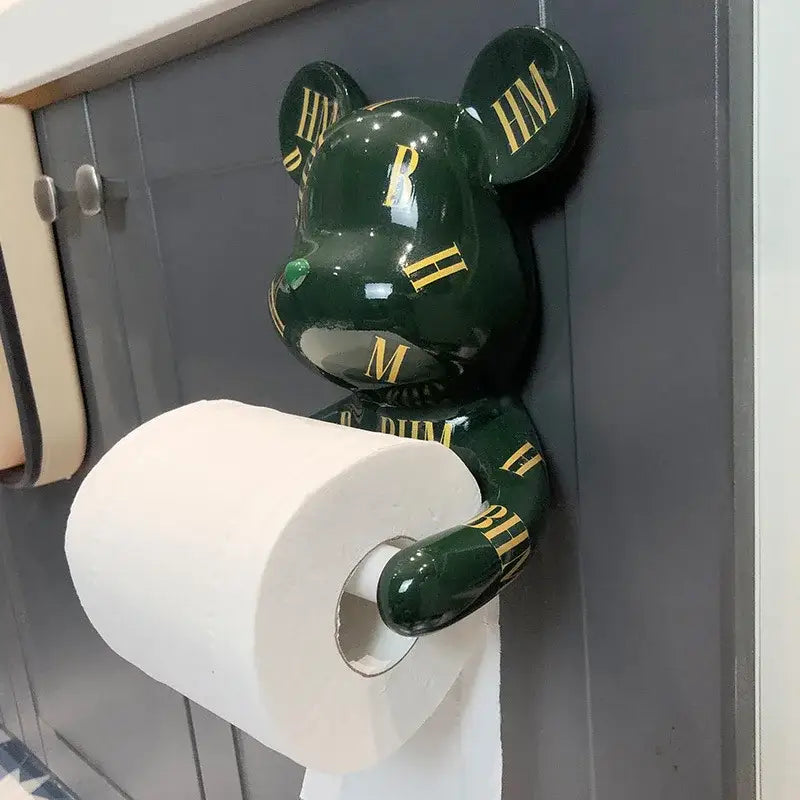 Dark green glossy resin paper towel holder shaped like a bear with gold roman numerals and hm lettering for bathroom decor