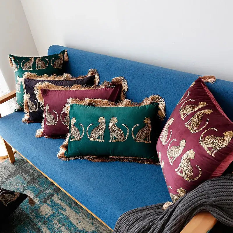 Set of dark green velvet cushion covers with decorbites leopard cheetah print embroidery and fringed edges for living room decor
