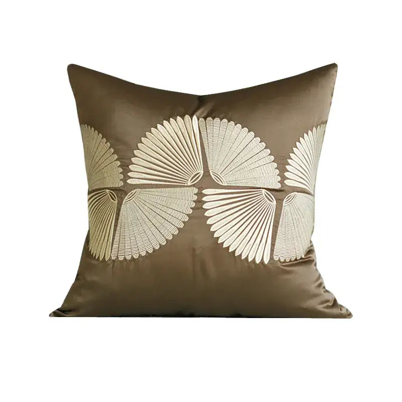 A satin-finish olive green pillow cover with cream embroidered fan motifs for decorbites dark orange geometric decor