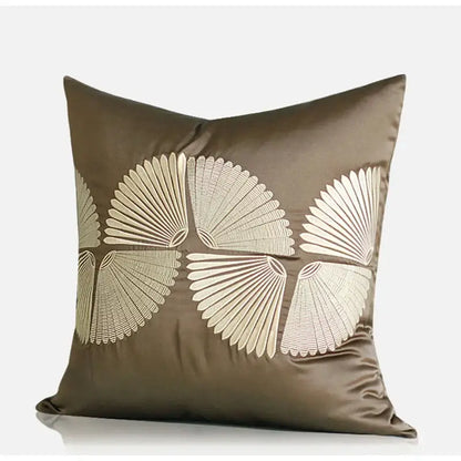 Dark orange geometric leather pillow cover with olive-green satin and cream embroidered fan decorbites dark orange decor
