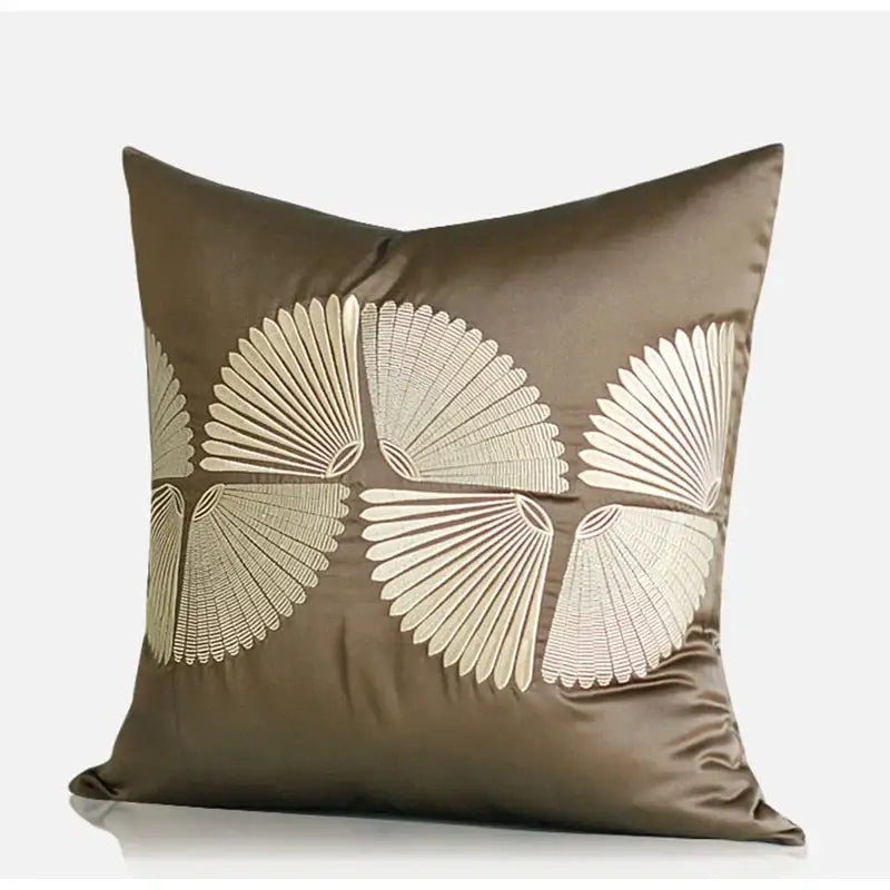 Dark orange geometric leather pillow cover with olive-green satin and cream embroidered fan decorbites dark orange decor