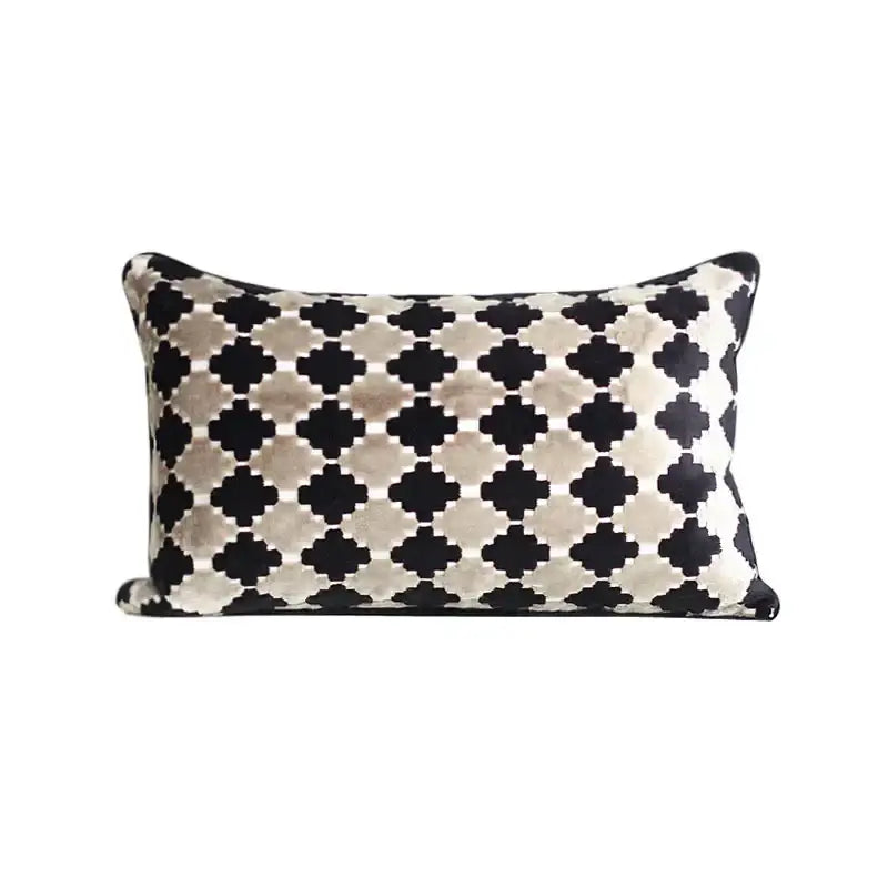 Dark orange geometric leather lumbar pillow cover featuring a black and cream velvet quatrefoil pattern for decorbites bedroom decor