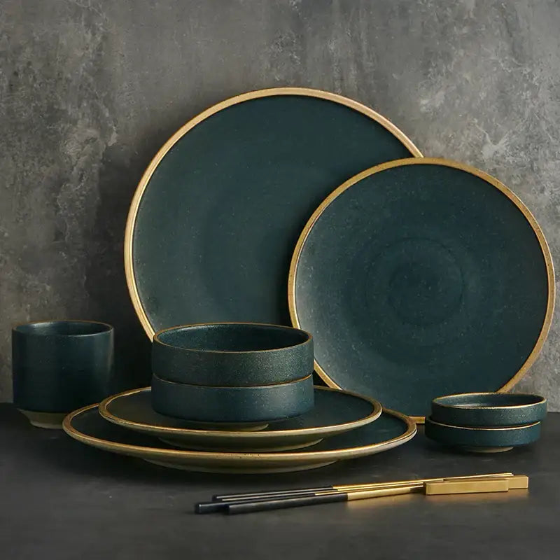 Dark teal gold rimmed ceramic western dinnerware set featuring plates bowls and cups for elegant dining decorbites ceramic western