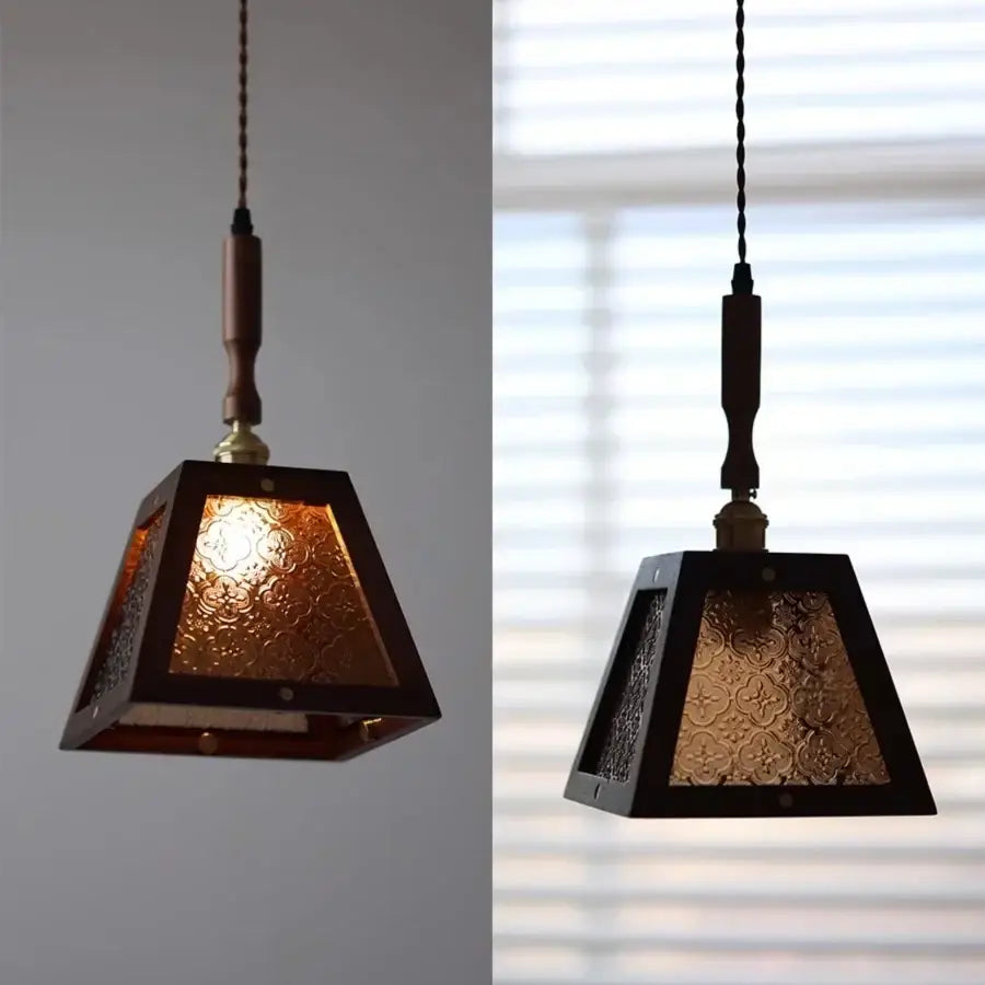 Dark wood and glass led pendant lamp with textured amber panels and twisted cord suspension for dining room use