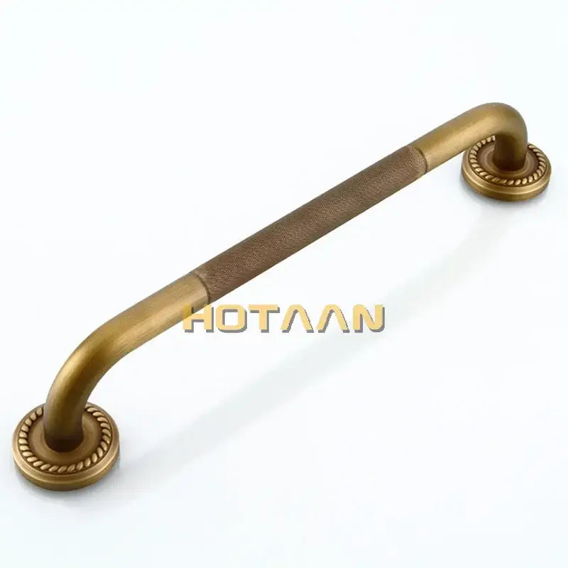 Antique brass-finished decorative bathroom safety grab bar with rope detail textured grip and ornate circular end caps