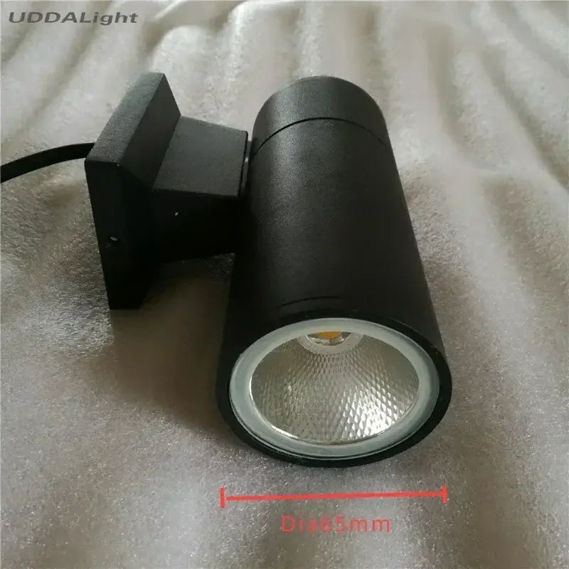 Modern black cylindrical 10w light wall spotlight with matte finish and adjustable bracket for outdoor porch lighting