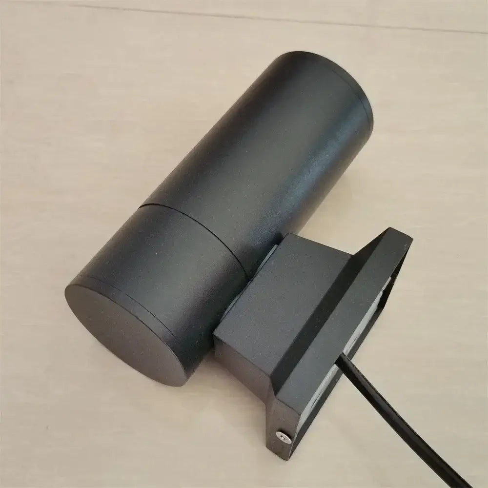 Modern black cylindrical 10w light wall outdoor porch spotlight with matte finish and rectangular mounting bracket