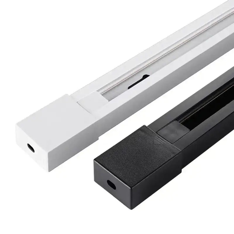 White and black aluminum track rail spotlight fitting with sleek rectangular profiles for modern kitchen lighting