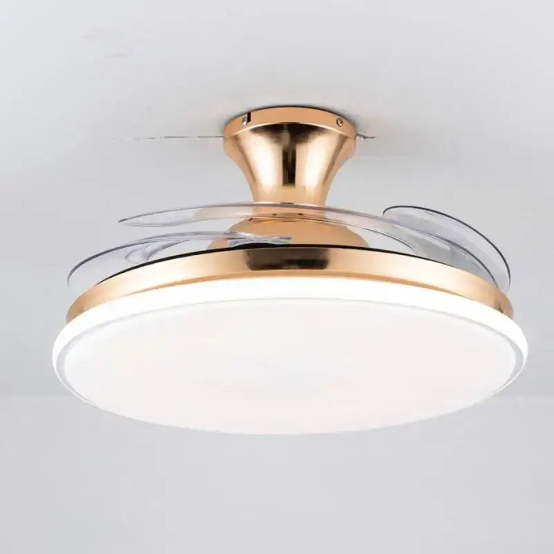 A modern white led ceiling fan with transparent blades and a gold metal frame featuring integrated bright white led lighting