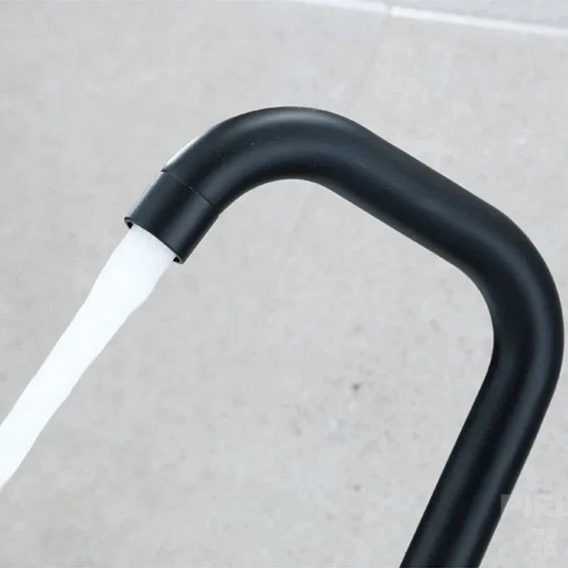 Decorbites™ black matte stainless steel rotating sink faucet with curved spout and flowing white water