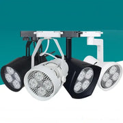 Modern black and white 35w led ceiling spot light with circular arrays of five bright bulbs in retail display fixture