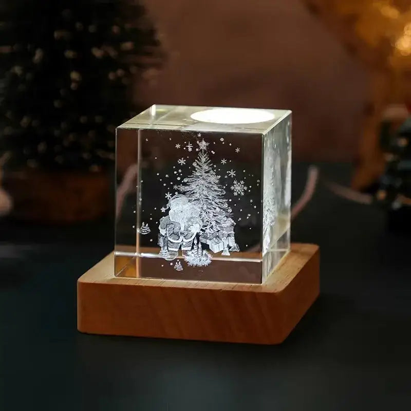 Clear crystal glass cube with laser engraved christmas scene featuring tree snowflakes and figures in decorbites 3d moon night light