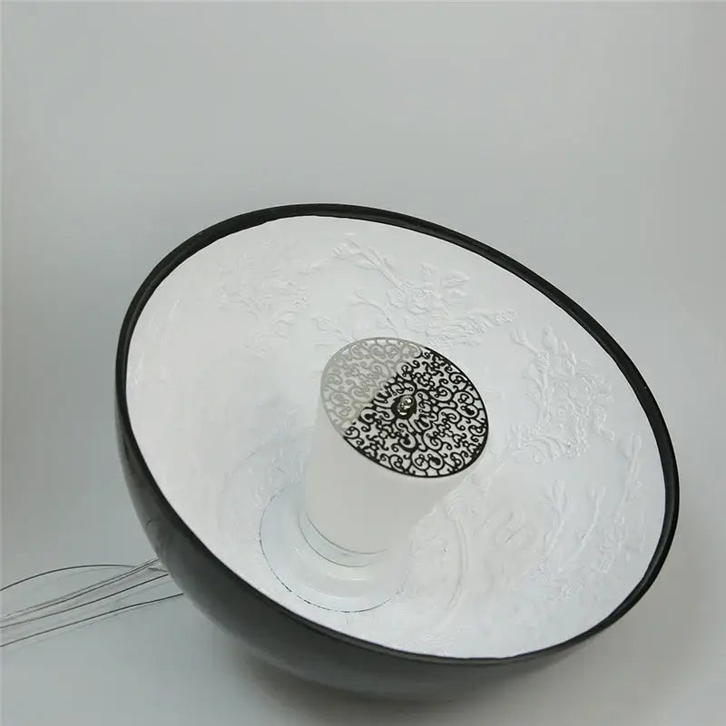 Black and white ceramic bowl with intricate filigree design complements modern black sky garden resin chandelier decorbites 3d sky