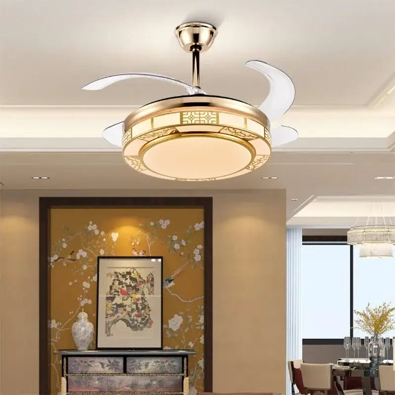 Modern geometric gold led ceiling fan with intricate patterns and three white blades for living room dimmable light