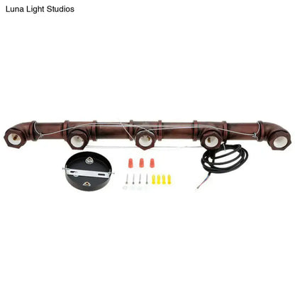 Brown faux-pipe steampunk straight pipe ceiling lamp with four integrated bulbs and mounting hardware for industrial decor