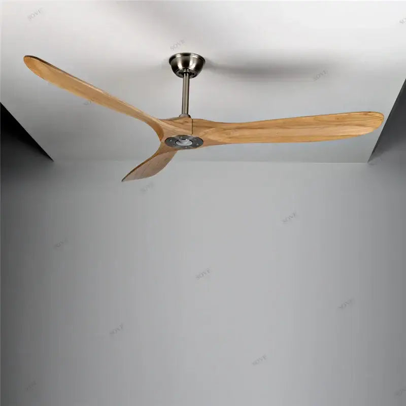 Vintage grey wood ceiling fan with three slender light brown wooden blades and brushed metallic hub for living room use