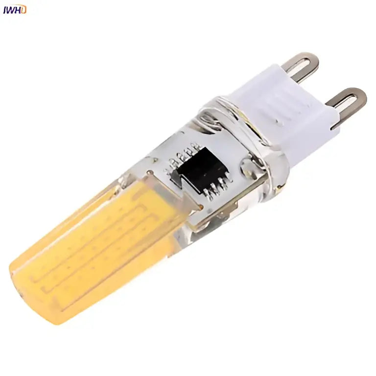 Clear glass decorbites dimmable led g9 bulb with warm yellow glow and dual pronged base for halogen replacement