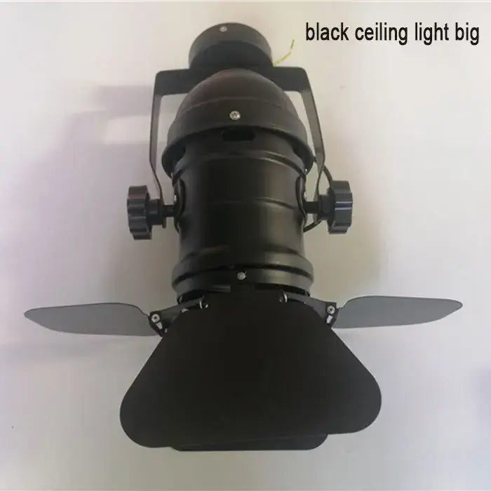 Black matte industrial-style DecorBites™ 5w COB LED track light with adjustable arms for clothing store spotlighting