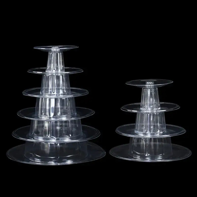 Clear plastic tier macaron tower stand with four circular levels and central column for cake display by DecorBites