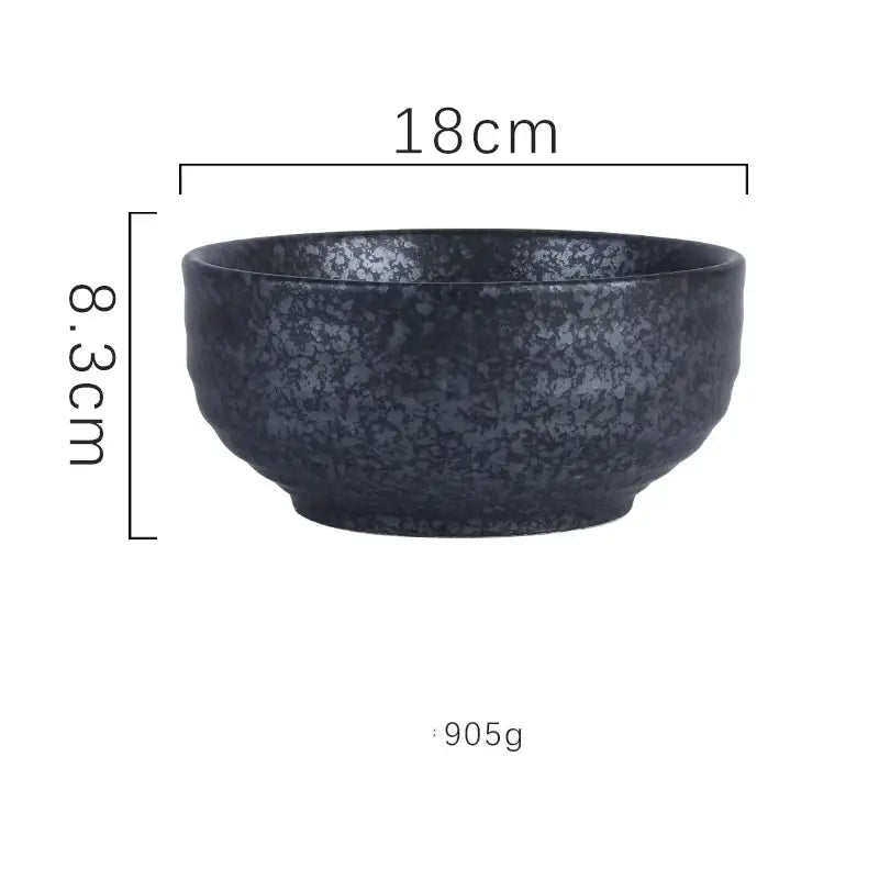 Dark gray ceramic ramen bowl with a speckled textured surface and rounded edges for kitchen and hotel use