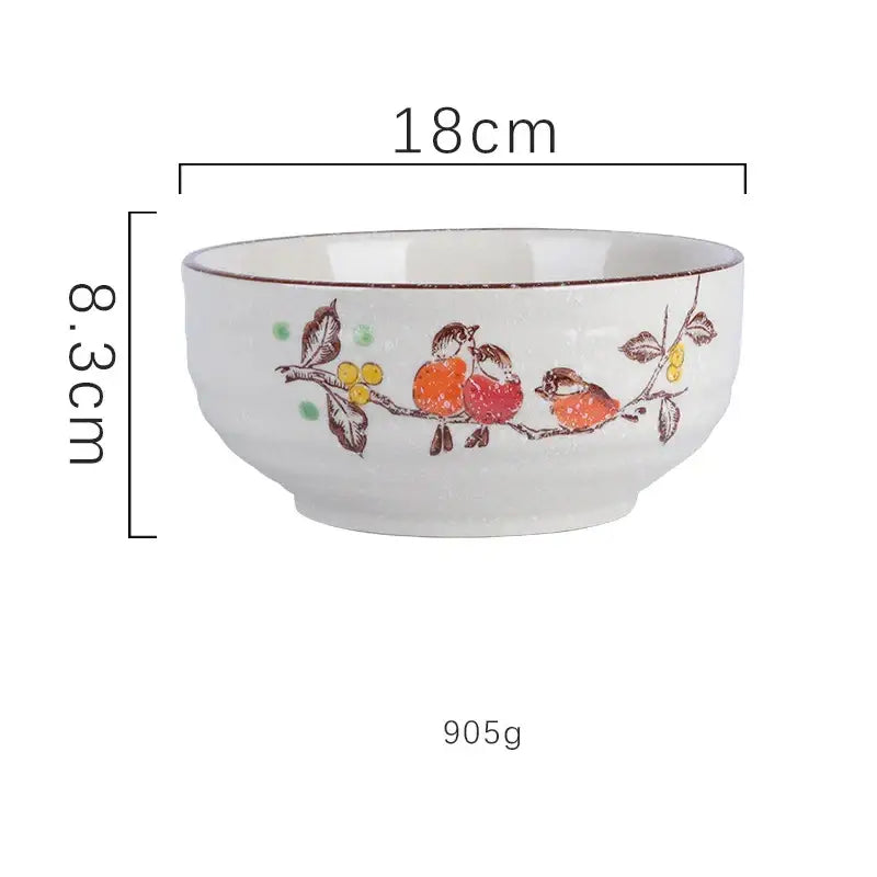 White ceramic ramen bowl with hand-painted orange birds and brown rim for kitchen and hotel use by DecorBites