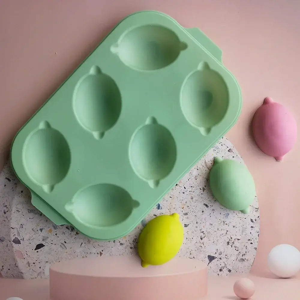 Mint green lemon shape silicone cake mold tray with 6 cavities for diy baking and decorating by decorbites
