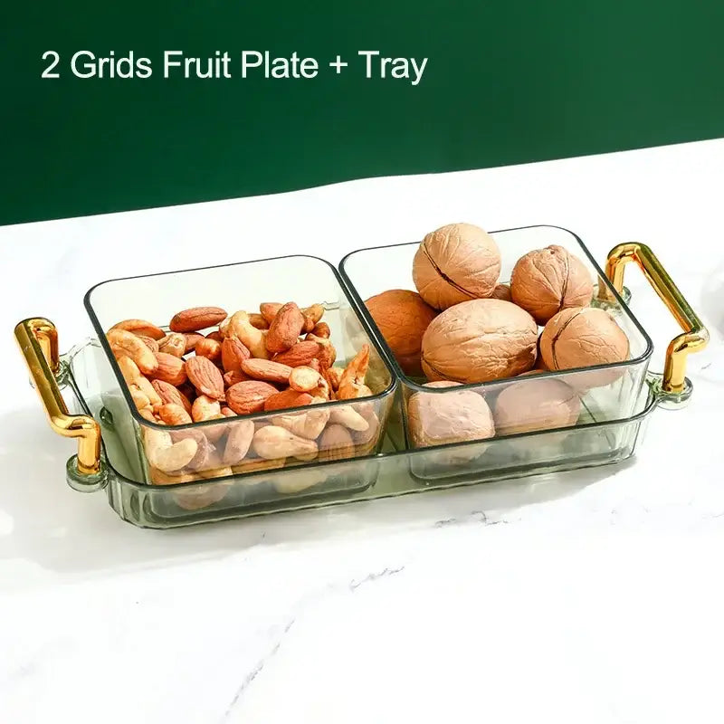 Clear glass 6-grid divided fruit plate with gold-tone handles filled with assorted nuts for elegant serving