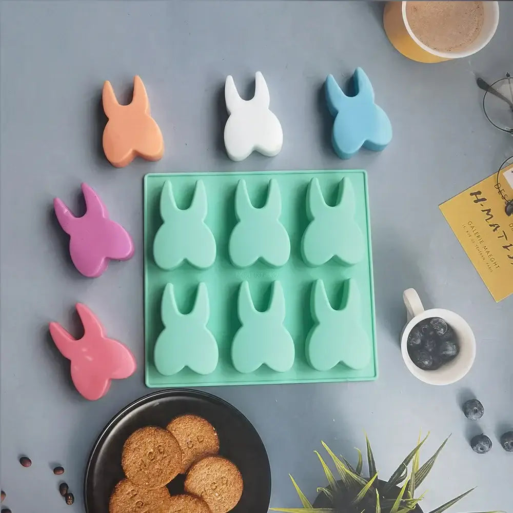 Mint green silicone mold bunny shaped with six cavities for ice cubes cake candy by DecorBites™ hole tooth silicone