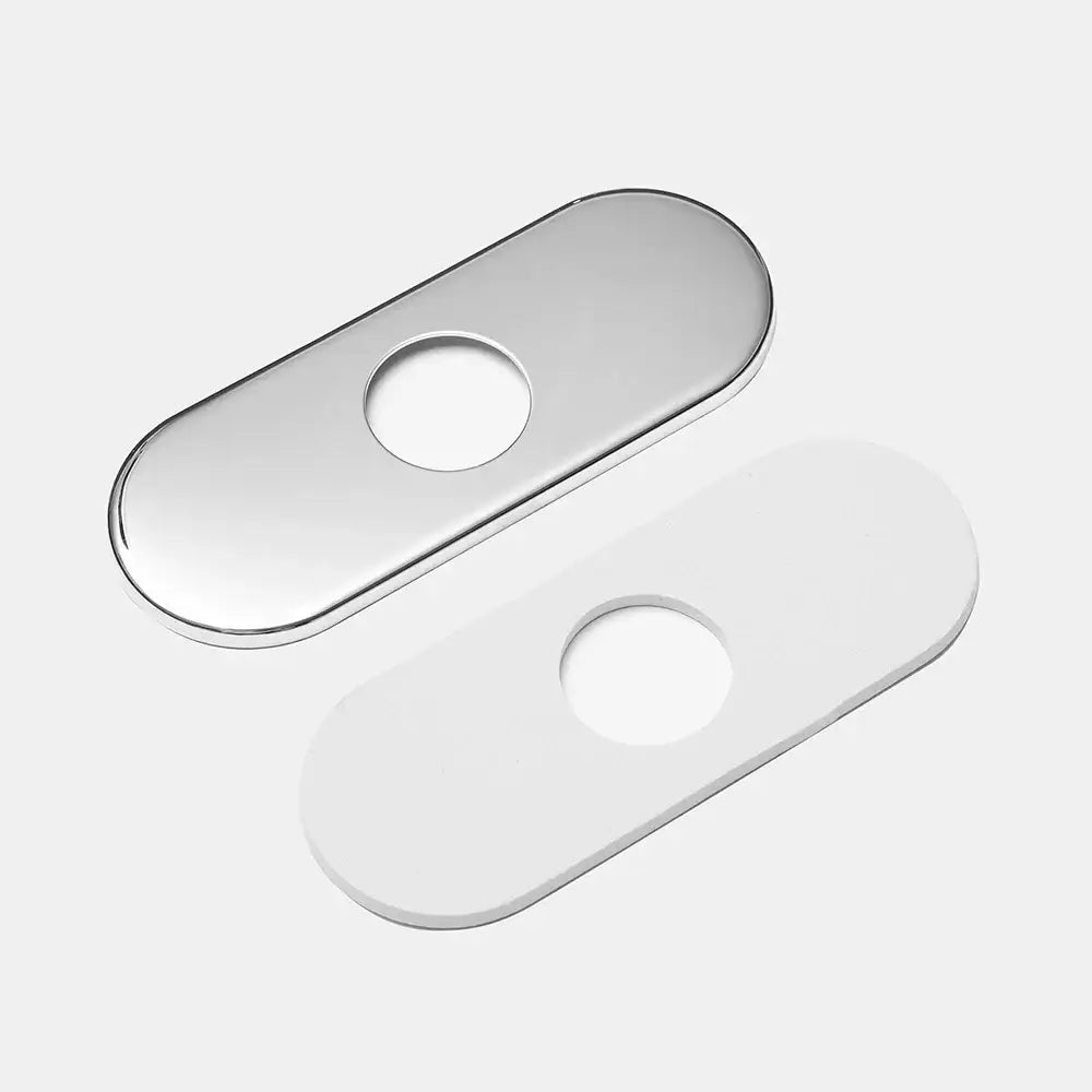 Shiny chrome and matte white oval bathroom sink deck plate with circular cutouts for unused kitchen faucet mounts