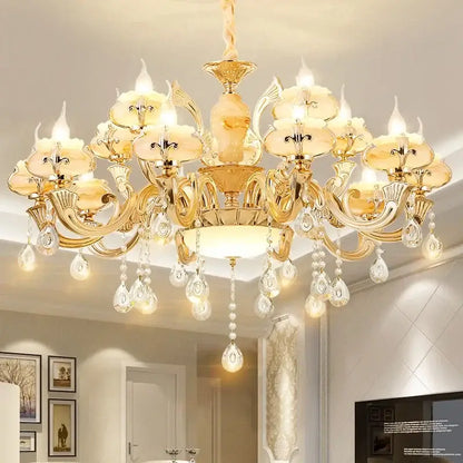 Gold-toned led dolomite chandelier with ornate crystal droplets and amber glass shades for foyer or living room lighting