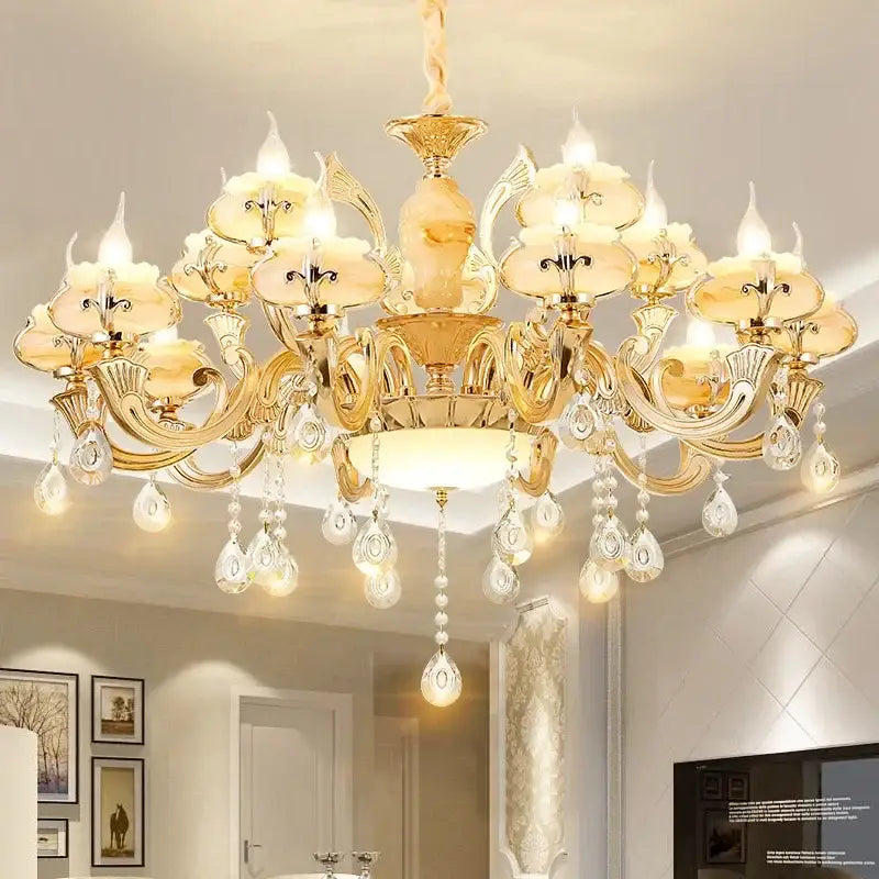 Gold-toned led dolomite chandelier with ornate crystal droplets and amber glass shades for foyer or living room lighting