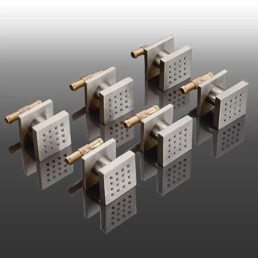 Set of modern square shower massage jets with brushed stainless steel and brass spout connectors for spa experience