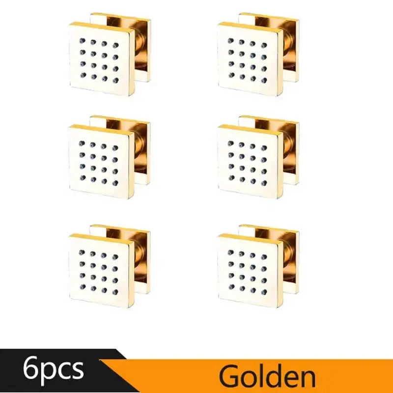 Golden square decorbites™ shower massage jets with polished metallic finish and grid of small perforations for spa experience