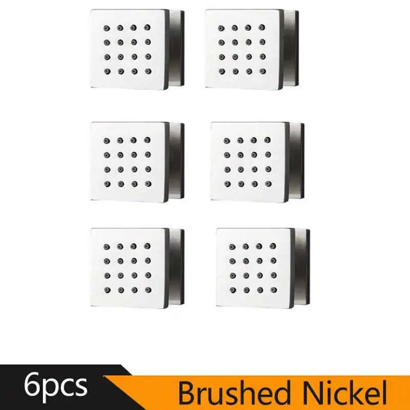 Six brushed nickel square glass shower massage jets with a black dotted front grid for bathroom spa experience