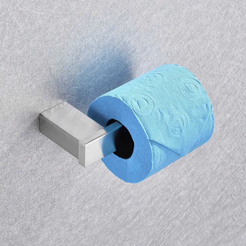 A sleek brushed nickel toilet paper holder with light blue textured tissue from the DecorBites brushed nickel bathroom set