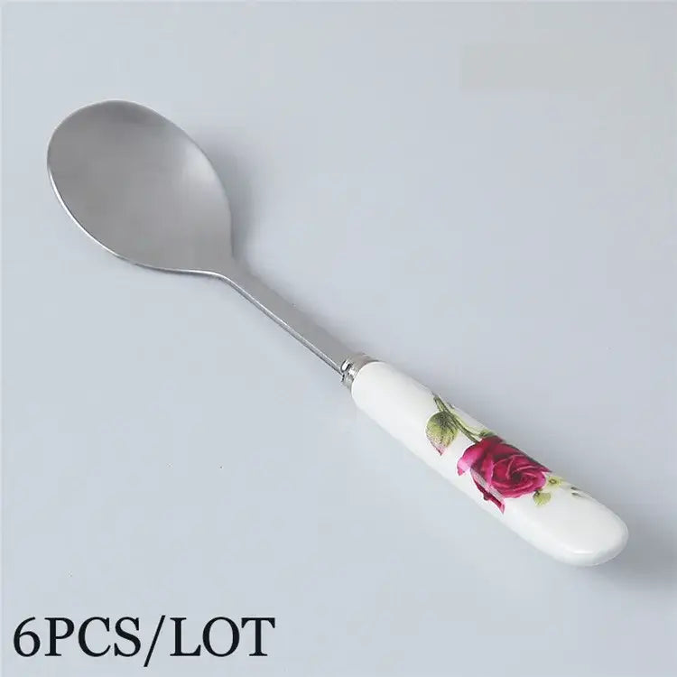 Decorbites™ coffee spoon set with white ceramic handle featuring pink rose and stainless steel bowl detail