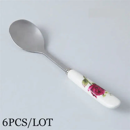 Decorbites™ coffee spoon set with white ceramic handle featuring pink rose and stainless steel bowl detail