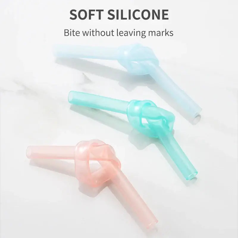 Pastel-colored DecorBites™ reusable silicone straws set with knotted design and cleaning brush eco-friendly party accessories