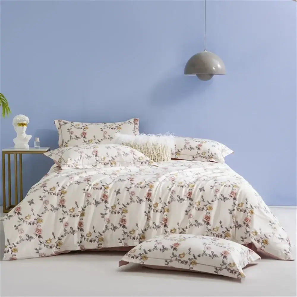 Cream-colored floral bedding set with delicate blossoms made from soft 600tc egyptian cotton by decorbites for queen king beds