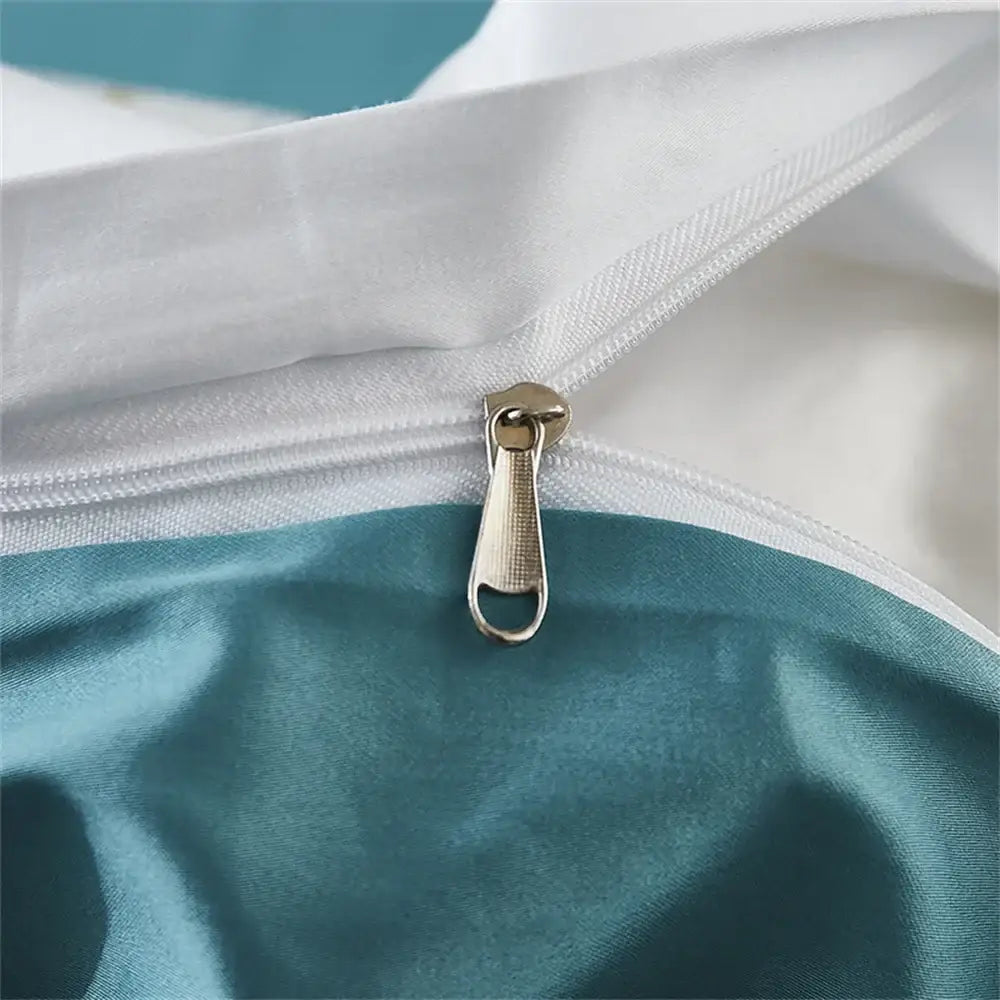 Silver-toned zipper pull with textured metallic finish on decorbites™ 600tc egyptian cotton bedding set