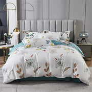 White floral duvet cover with teal accents and botanical print in soft earth tones made from DecorBites™ 600TC Egyptian cotton bedding set